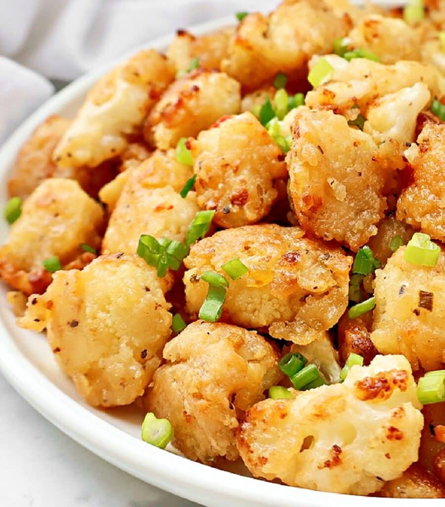 Crispy Bang Bang Cauliflower tossed in a bold, sweet, and spicy sauce. A restaurant-style dish made easy at home!