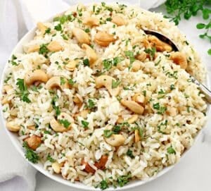 Cashew Rice Pilaf ~ Fluffy rice and crunchy cashews - a easy side dish ready to serve in under 30 minutes! Vegetarian and Vegan.