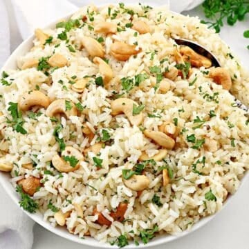 Cashew Rice Pilaf ~ Fluffy rice and crunchy cashews - a easy side dish ready to serve in under 30 minutes! Vegetarian and Vegan.