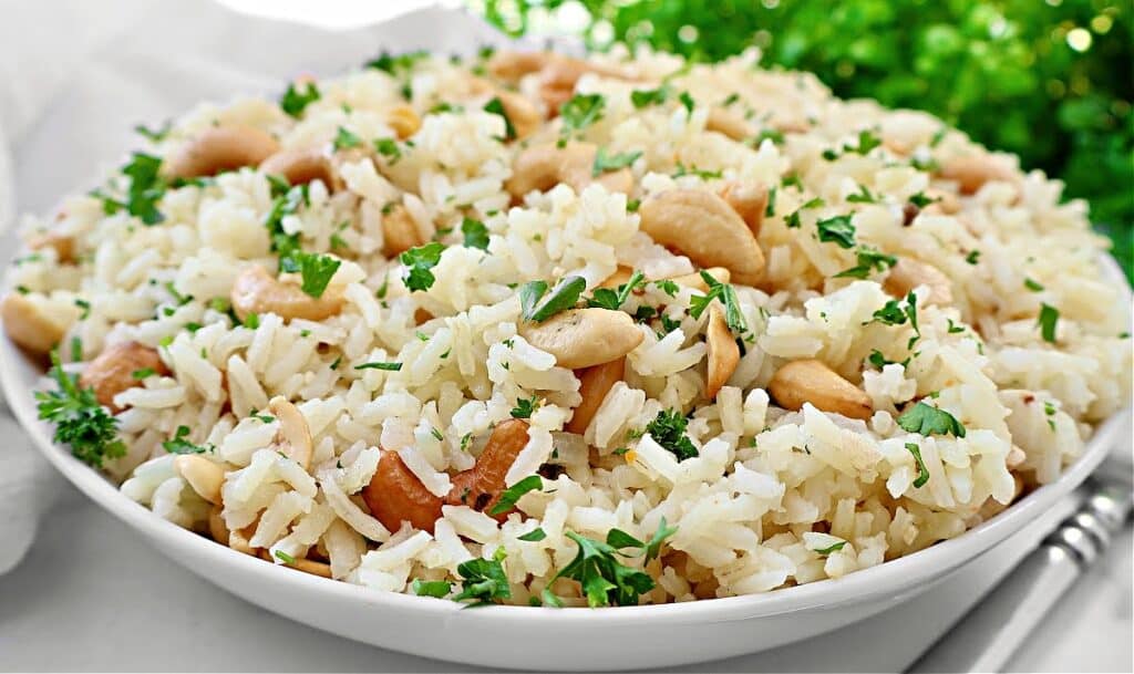 Cashew Rice Pilaf ~ Fluffy rice and crunchy cashews - a easy side dish ready to serve in under 30 minutes! Vegetarian and Vegan.