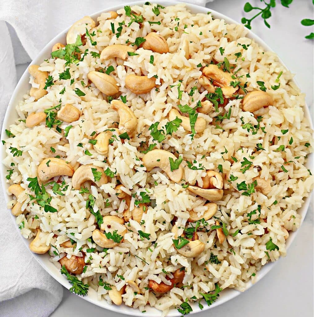 Cashew Rice Pilaf ~ Fluffy rice and crunchy cashews - a easy side dish ready to serve in under 30 minutes! Vegetarian and Vegan.