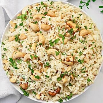 Cashew Rice Pilaf ~ Fluffy rice and crunchy cashews - a easy side dish ready to serve in under 30 minutes! Vegetarian and Vegan.