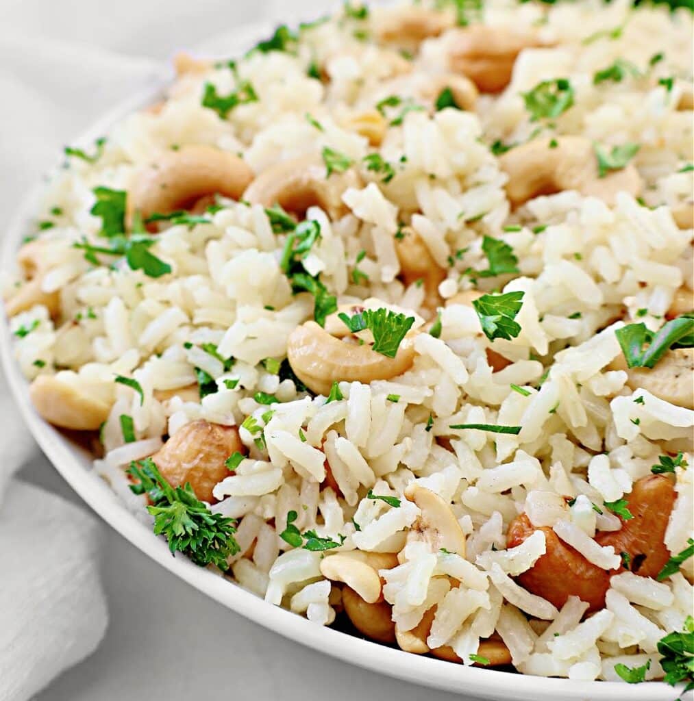 Cashew Rice Pilaf ~ Fluffy rice and crunchy cashews - a easy side dish ready to serve in under 30 minutes! Vegetarian and Vegan.