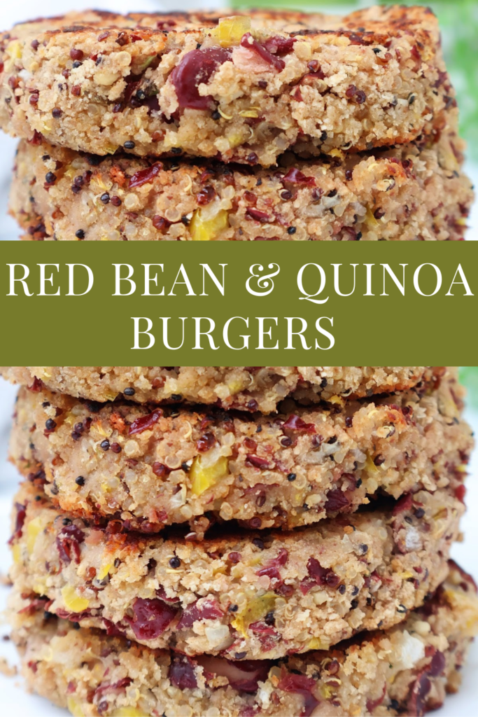 Four stacked red bean and quinoa patties with visible bits of yellow peppers and grains, shown up close. A green banner across the center reads Red Bean & Quinoa Burgers in white text.