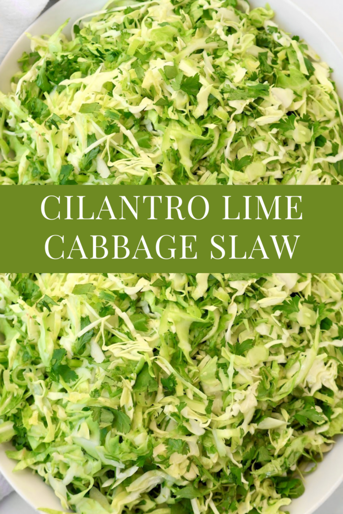 A close-up of a bowl filled with shredded green cabbage and cilantro slaw, with a green banner in the center that reads Cilantro Lime Cabbage Slaw in white text.